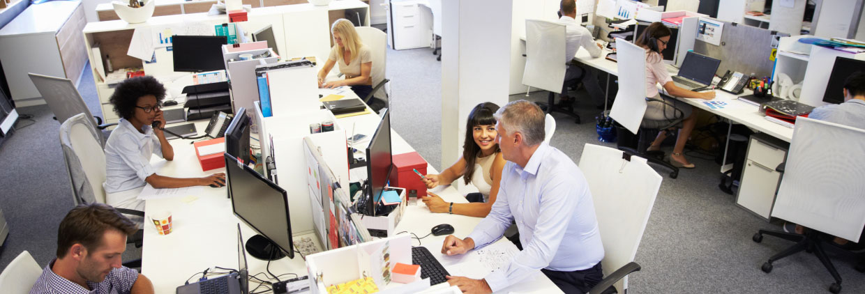 A team of professionals collaborating in a modern office setting.